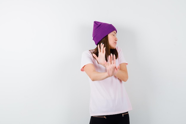 Expressive young woman posing in the studio