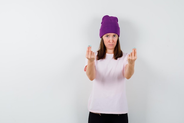 Expressive young woman posing in the studio