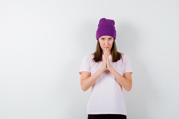 Expressive young woman posing in the studio