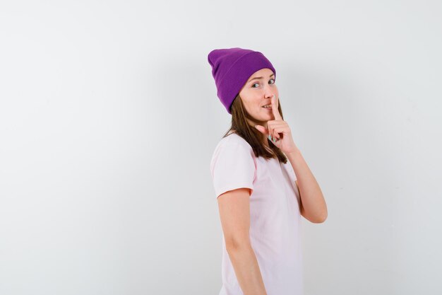 Expressive young woman posing in the studio