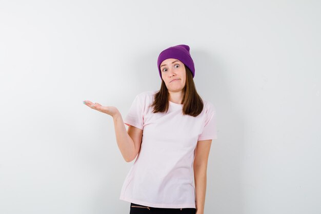 Expressive young woman posing in the studio