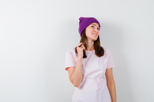 Expressive young woman posing in the studio