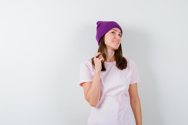 Expressive young woman posing in the studio