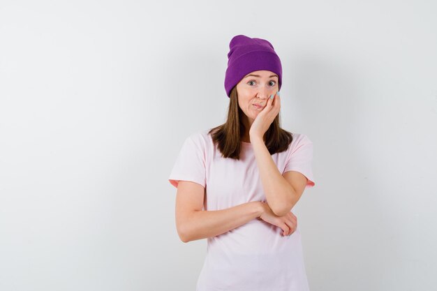 Expressive young woman posing in the studio