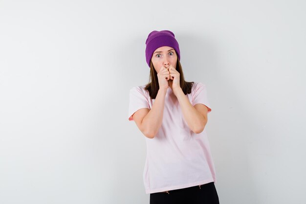 Expressive young woman posing in the studio