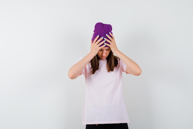 Expressive young woman posing in the studio