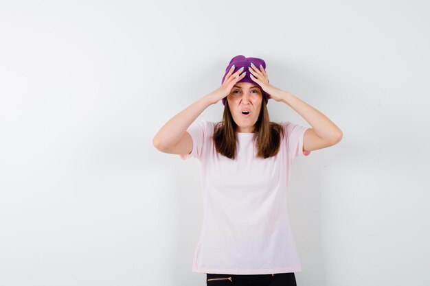 Expressive young woman posing in the studio