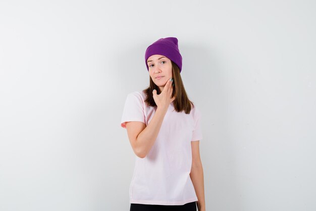 Expressive young woman posing in the studio