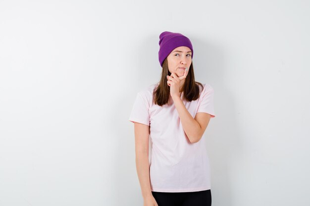 Expressive young woman posing in the studio