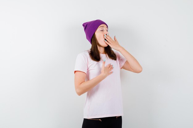 Expressive young woman posing in the studio