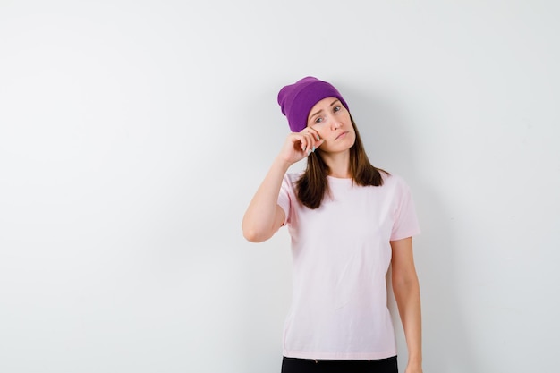 Expressive young woman posing in the studio