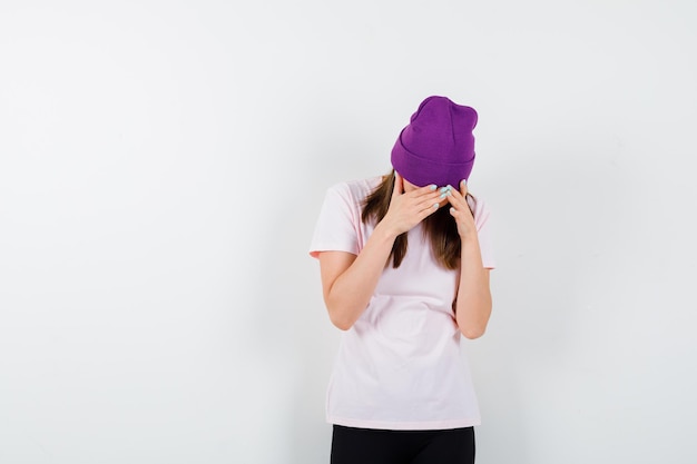 Expressive young woman posing in the studio