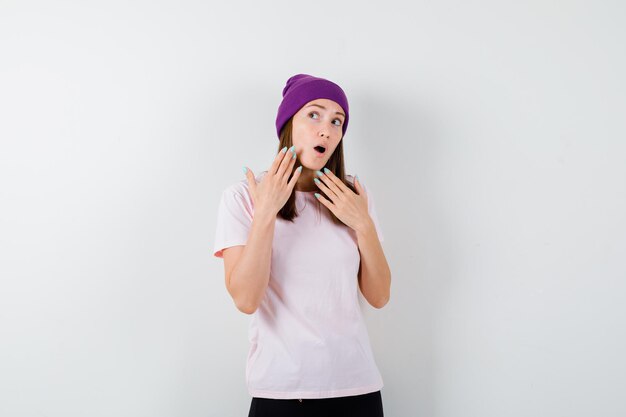 Expressive young woman posing in the studio