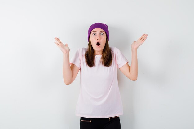 Expressive young woman posing in the studio