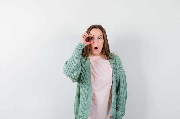 Expressive young woman posing in the studio