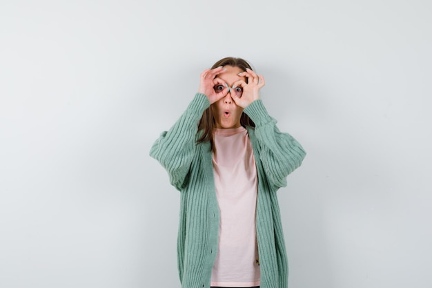 Expressive young woman posing in the studio