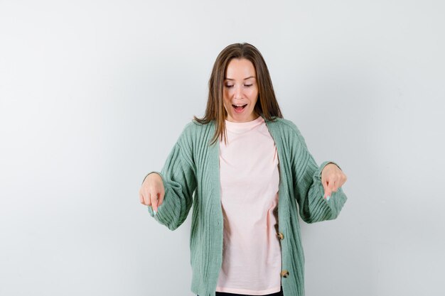 Expressive young woman posing in the studio