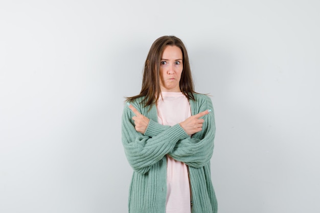 Expressive young woman posing in the studio