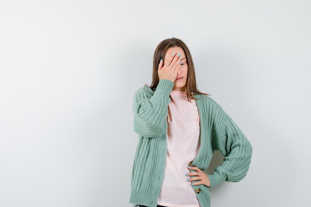 Expressive young woman posing in the studio