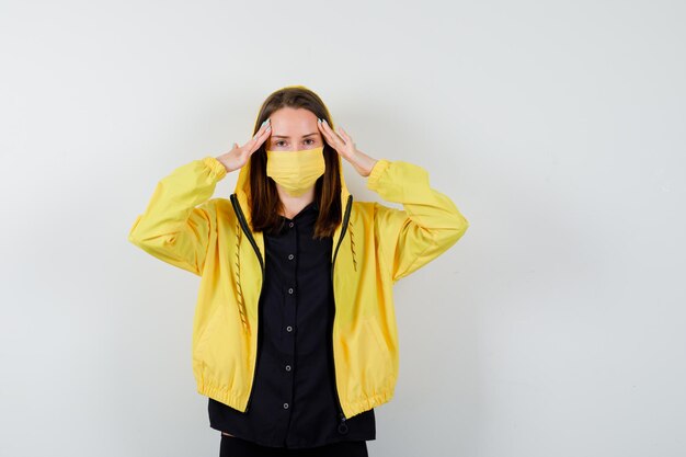 Expressive young woman posing in the studio