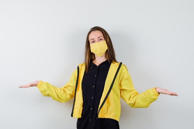 Expressive young woman posing in the studio