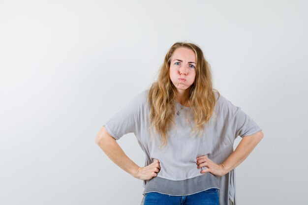 Expressive young woman posing in the studio