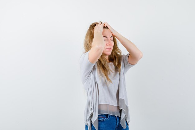 Expressive young woman posing in the studio