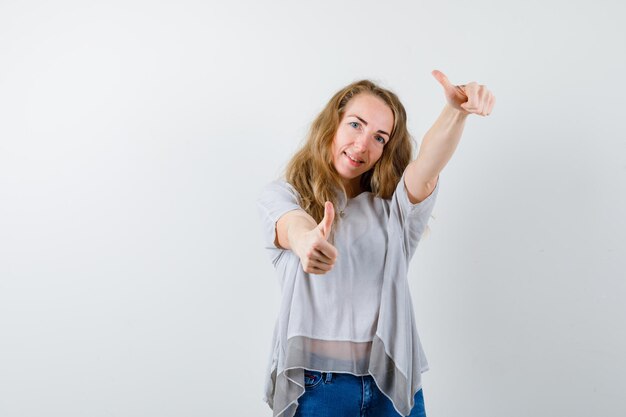 Expressive young woman posing in the studio