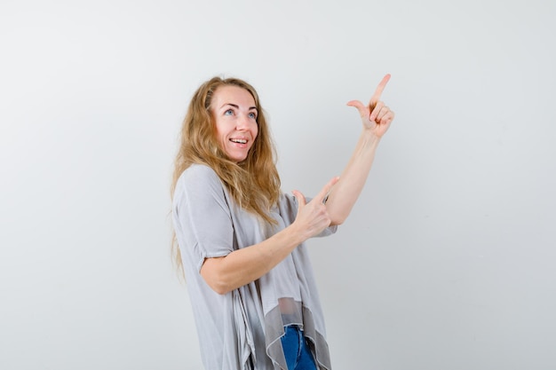 Expressive young woman posing in the studio