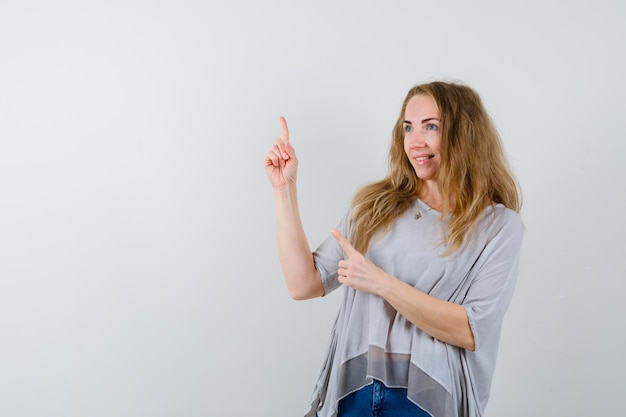 Expressive young woman posing in the studio