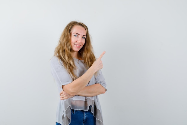 Expressive young woman posing in the studio