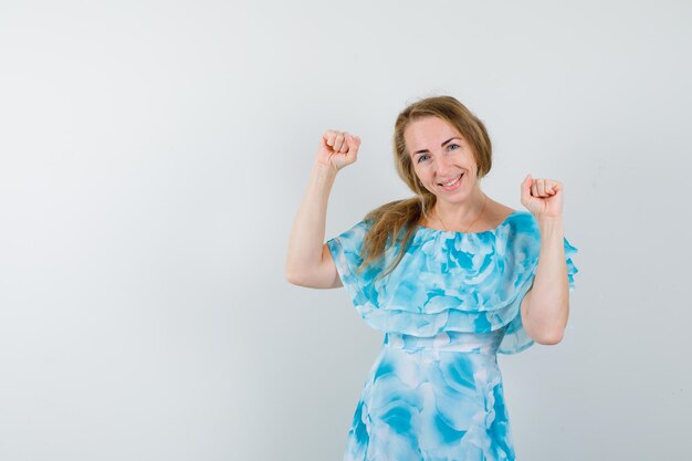 Expressive young woman posing in the studio