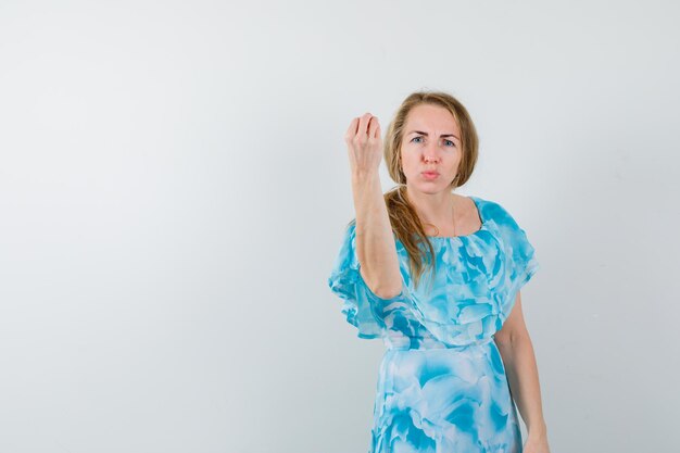 Expressive young woman posing in the studio