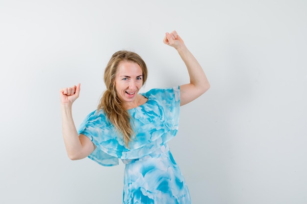 Expressive young woman posing in the studio