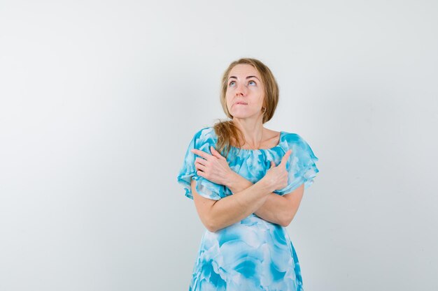 Expressive young woman posing in the studio