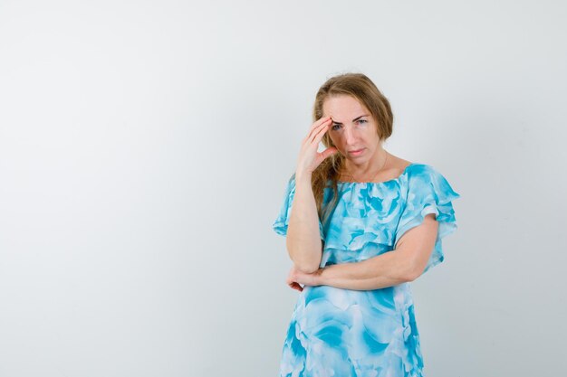 Expressive young woman posing in the studio