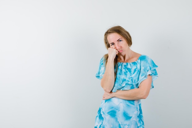 Expressive young woman posing in the studio