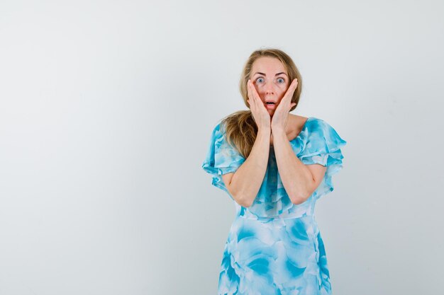 Expressive young woman posing in the studio