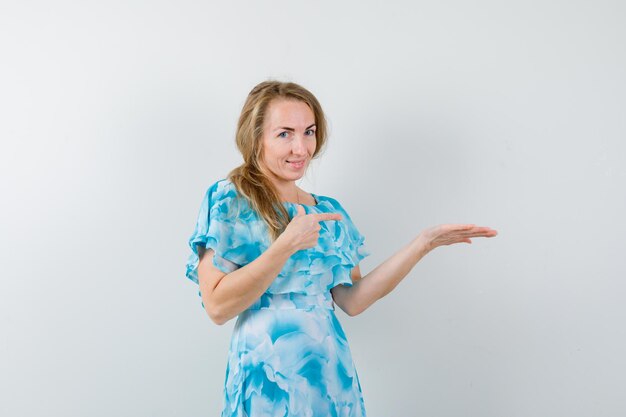 Expressive young woman posing in the studio