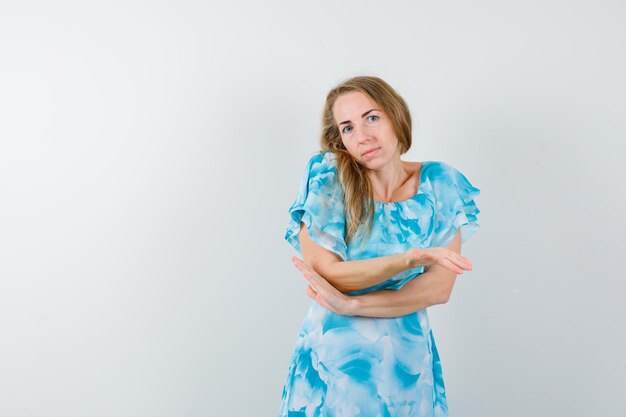 Expressive young woman posing in the studio