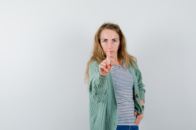 Expressive young woman posing in the studio