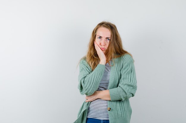 Expressive young woman posing in the studio