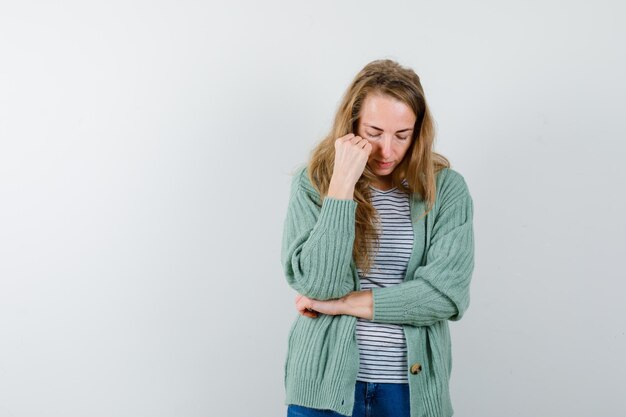 Expressive young woman posing in the studio