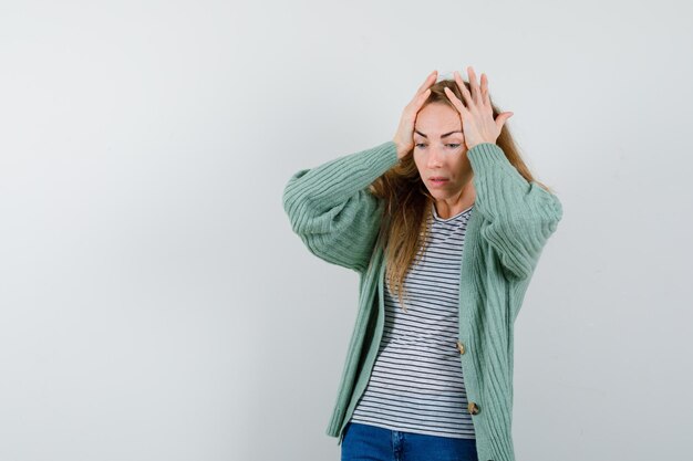 Expressive young woman posing in the studio