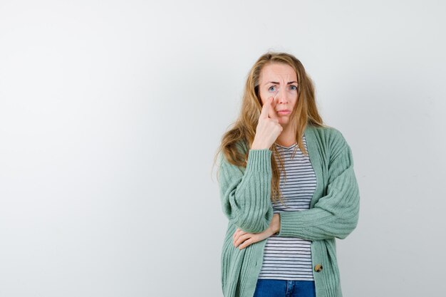 Expressive young woman posing in the studio