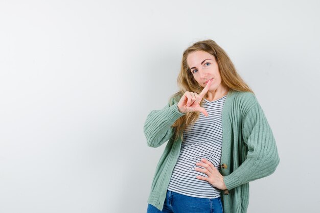 Expressive young woman posing in the studio