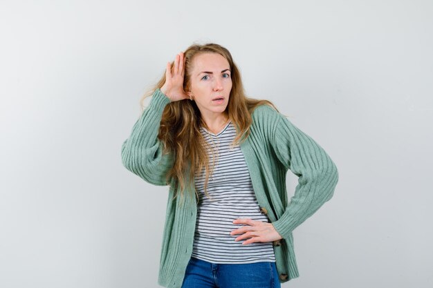 Expressive young woman posing in the studio