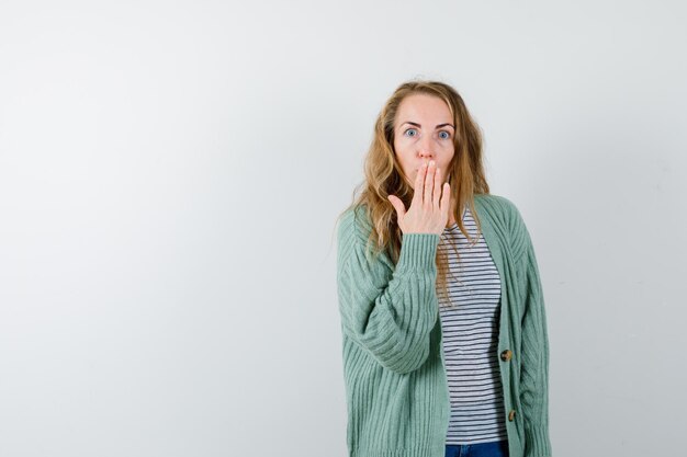 Expressive young woman posing in the studio