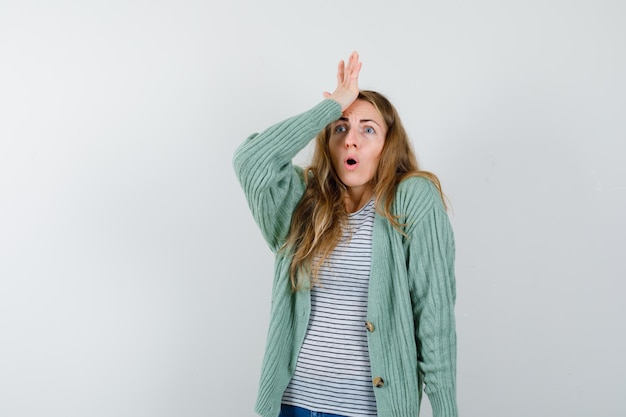 Expressive young woman posing in the studio