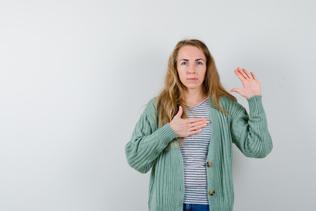 Expressive young woman posing in the studio